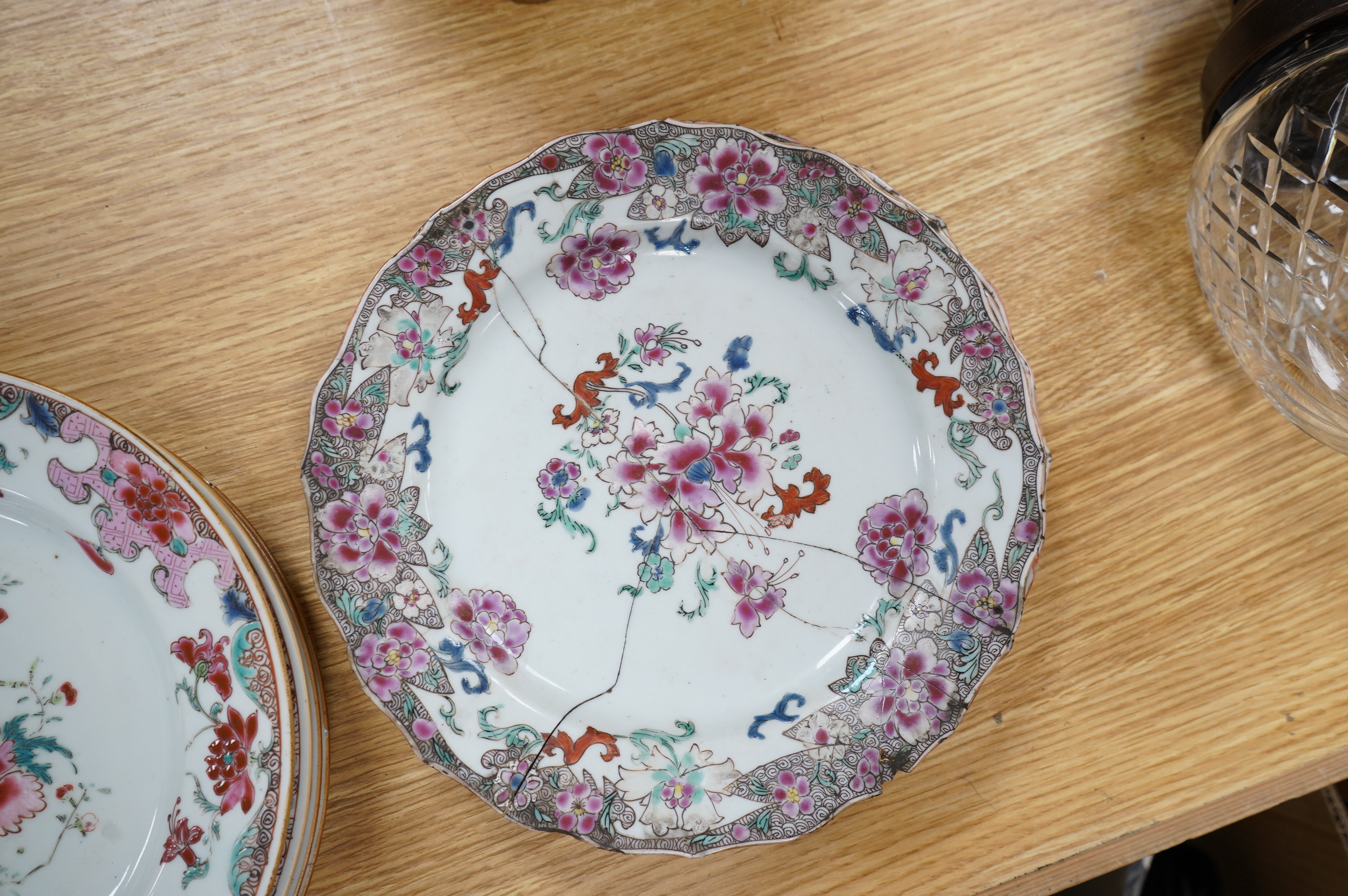 A set of five Chinese porcelain famille rose dishes, diameter 22.5cm, and three others (8). Condition - poor, significant damage to many.